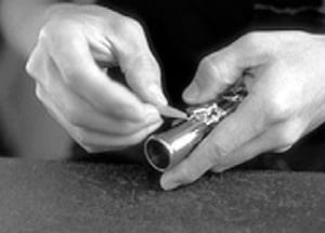 Checking pad coverage on flute